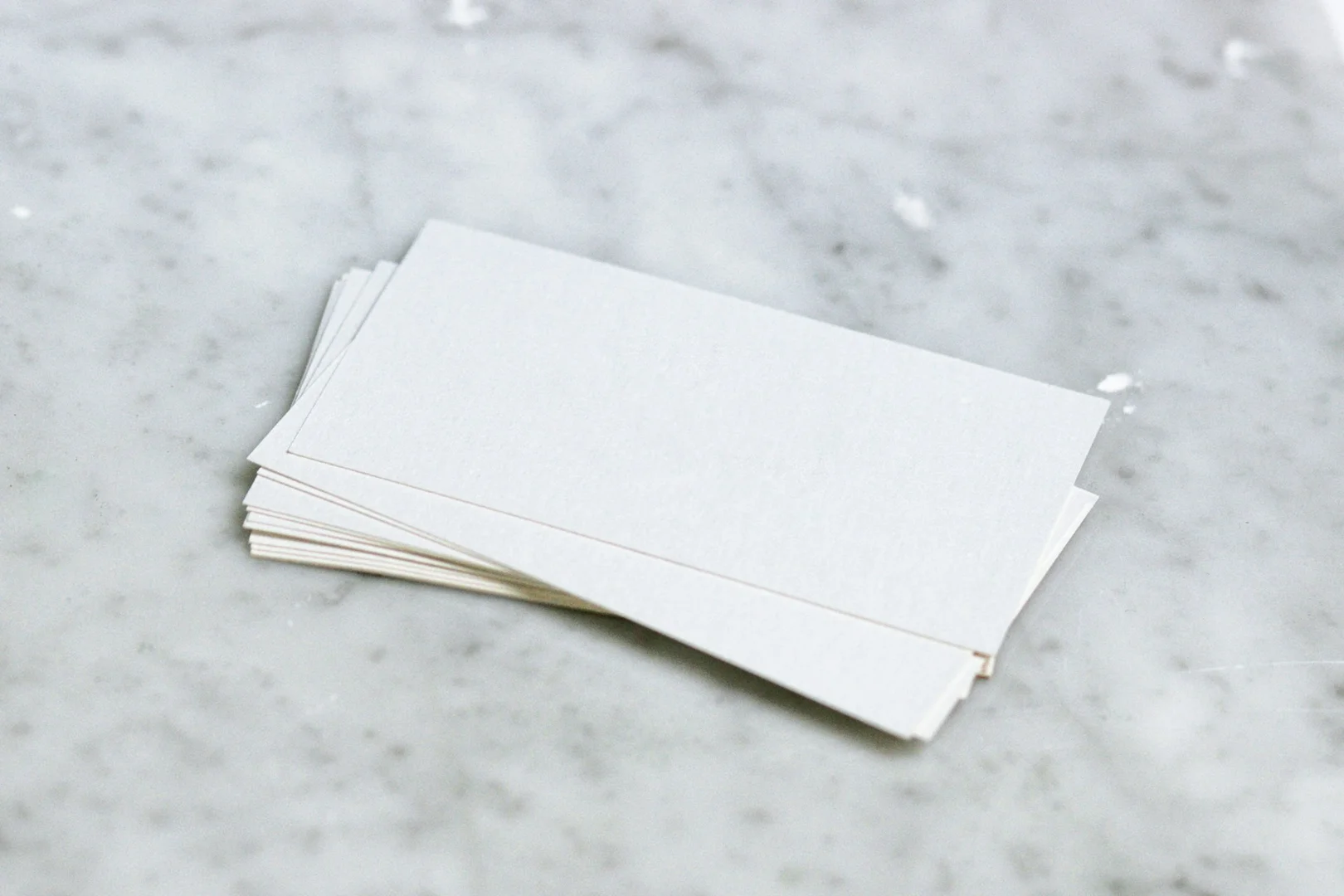 Stack of envelopes representing paperwork replaced by digital lunch ordering systems.
