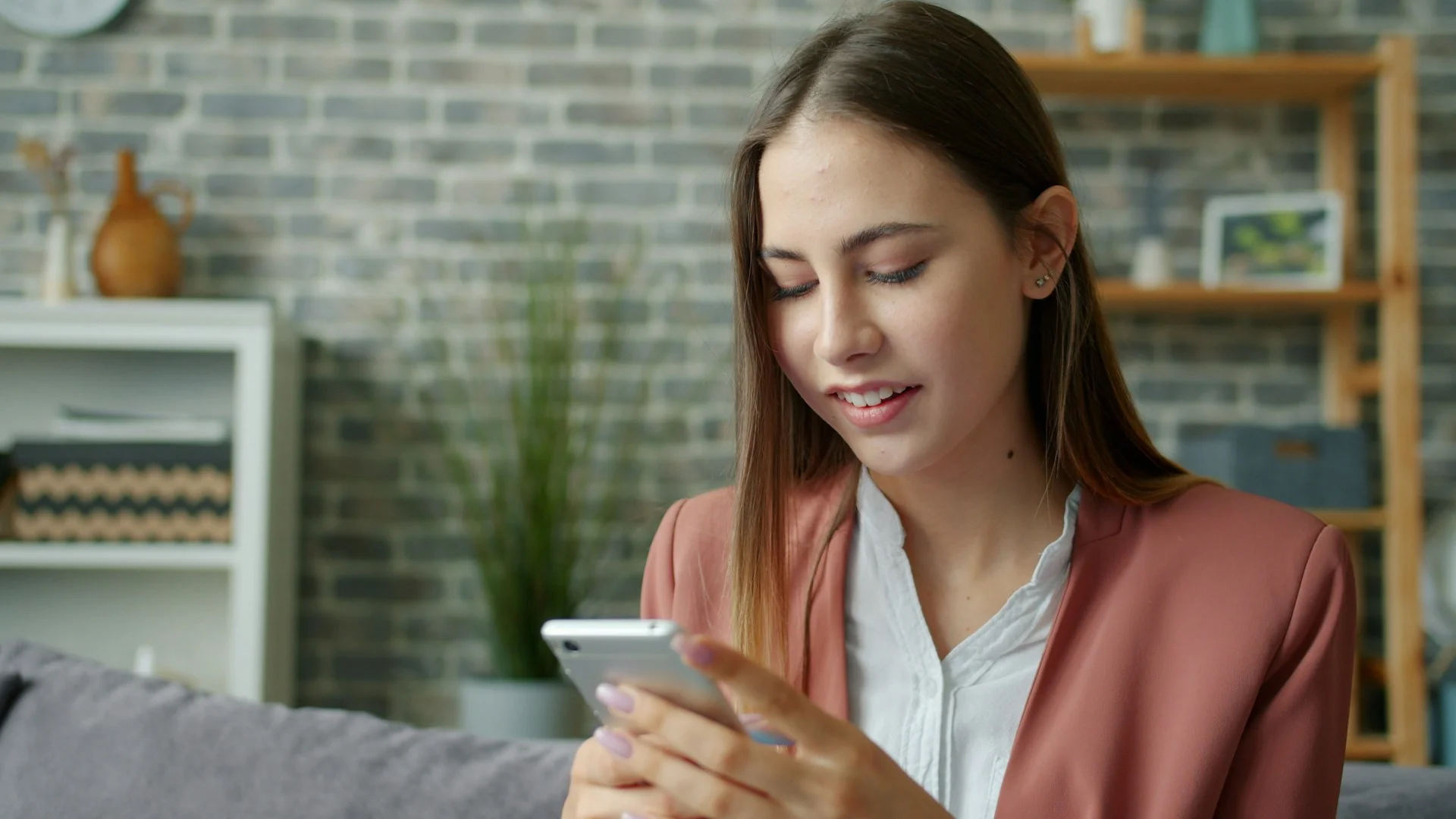 Parent using a mobile phone to place an online school lunch order.