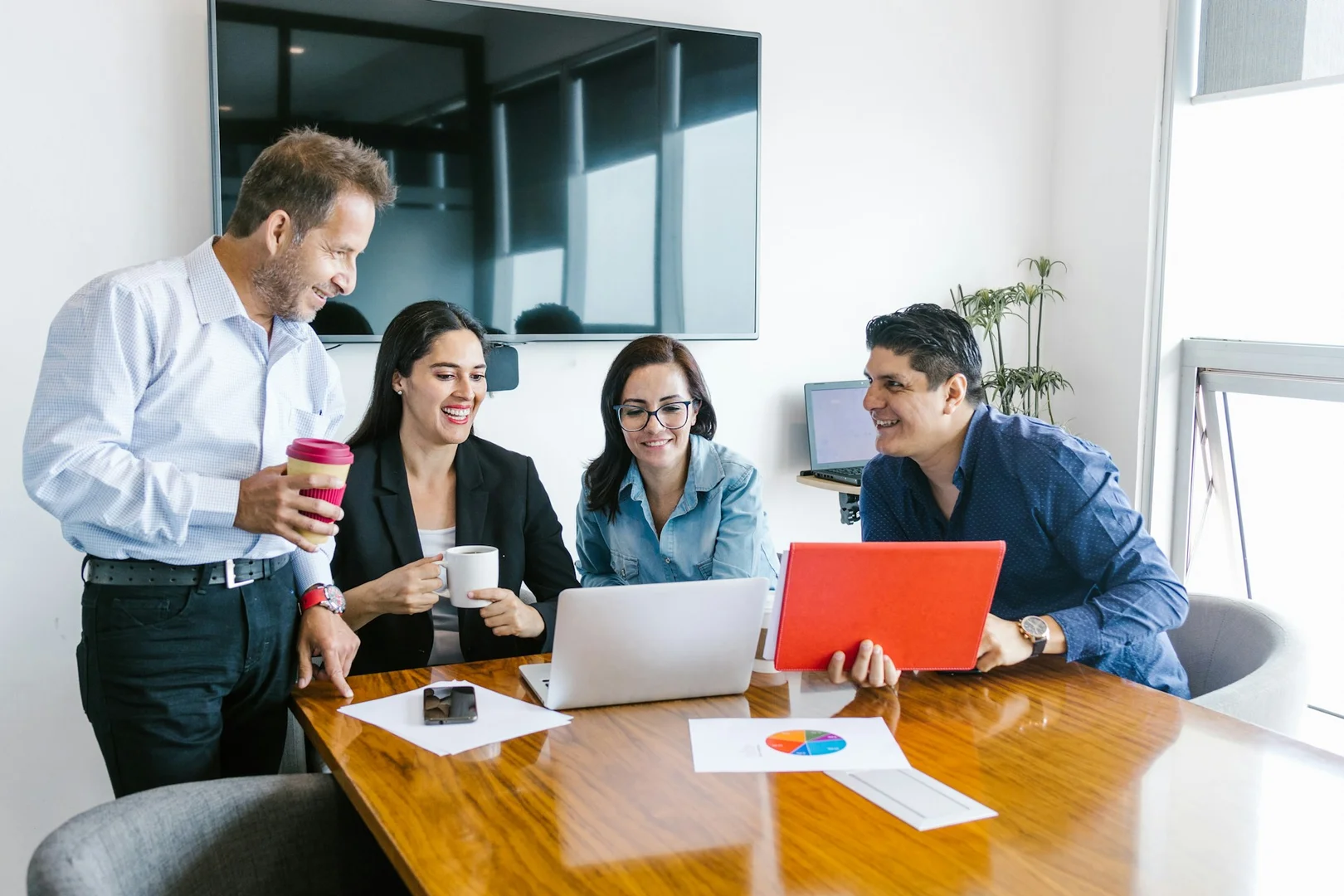 Restaurant team discussing partnership opportunities with schools for lunch programs.