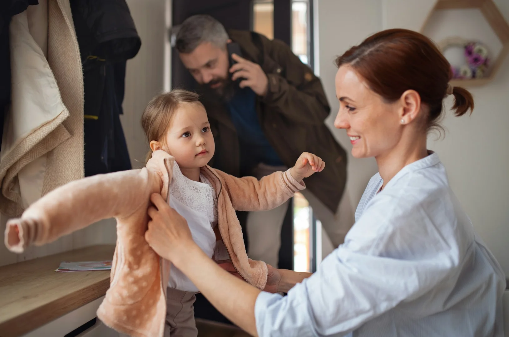 Family enjoying a calm morning routine before school with lunch planning already done.